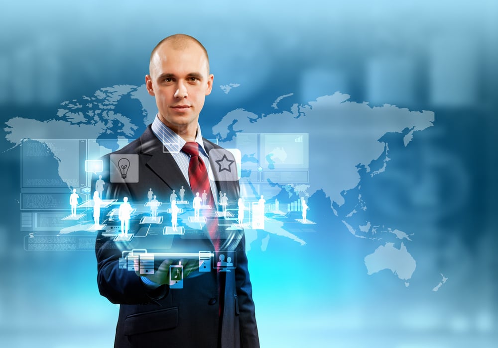 Image of businessman with tablet pc against high-tech background